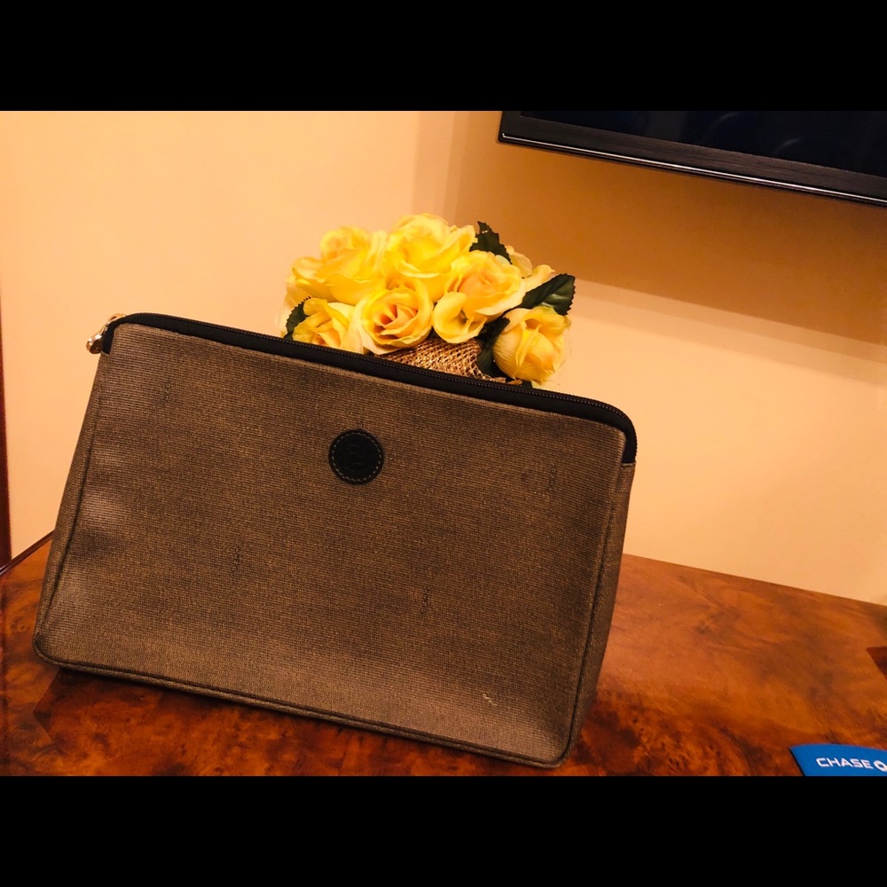 Authentic Vintage Fendi clutch nice and clean.